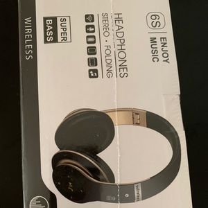 black and gold wireless headphones